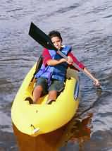 A young paddler Kayaking at henderson park Florida